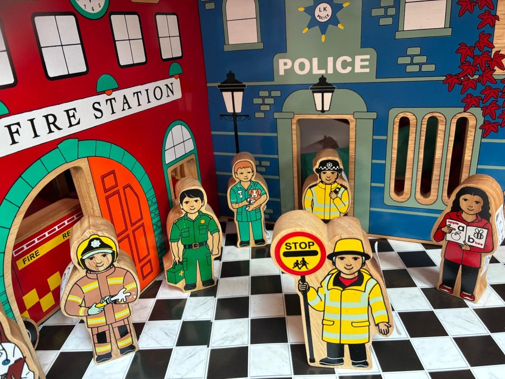 Wooden uniformed figures
